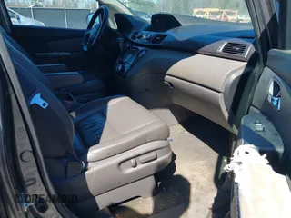 2014 Honda Odyssey EX-L with VIN 5FNRL5H61EB014695, listed as a IAAI auction lot 41694860 with 261,265 mi miles and . Bid and sale history available at DreamBid. Image 5.