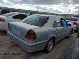 2000 Mercedes-Benz C 230/260/280/320 z VIN WDBHA29G8YA830399, wystawiony jako Copart lot #86919894 z przebiegiem 89 183 mil mil oraz Nie do naprawy • Non repairable. Historia ofert i sprzedaży dostępna na DreamBid. Obrazek 3.