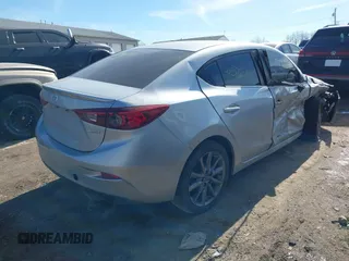 2018 Mazda 3 Touring z VIN 3MZBN1V36JM205904, wystawiony jako IAAI lot #41586707 z przebiegiem 145 401 mil mil oraz . Historia ofert i sprzedaży dostępna na DreamBid. Obrazek 4.