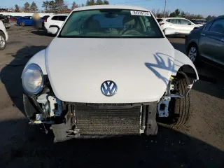 2014 Volkswagen Beetle 2.5L w/Sun with VIN 3VWJP7AT8EM610831, listed as a Copart auction lot 84318174 with 136,931 mi miles and Salvage Title. Bid and sale history available at DreamBid. Image 5.