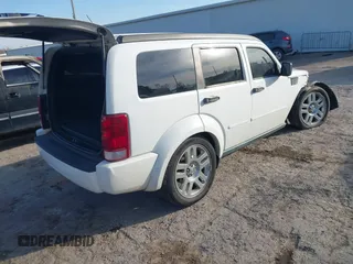 2011 Dodge Nitro Heat z VIN 1D4PT4GK0BW582589, wystawiony jako IAAI lot #41015035 z przebiegiem 130 098 mil mil oraz . Historia ofert i sprzedaży dostępna na DreamBid. Obrazek 4.