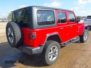 2018 Jeep Wrangler Unlimited Sahara z VIN 1C4HJXEN7JW224927, wystawiony jako IAAI lot #41515557 z przebiegiem 81 138 mil mil oraz . Historia ofert i sprzedaży dostępna na DreamBid. Obrazek 4.