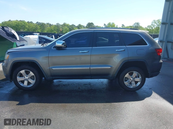 2012 Jeep Grand Cherokee Limited with VIN 1C4RJEBG1CC258123, listed as a IAAI auction lot 42065345 with 168,852 mi miles. Bid and sale history available at carsss.com. Image 14.