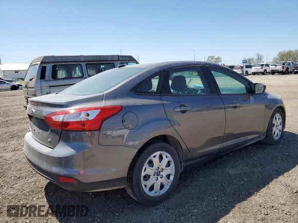 2012 Ford Focus SE with VIN 1FAHP3F23CL243982, listed as a Copart auction lot 52801055 with 143,695 mi miles and Salvage Title. Bid and sale history available at carsss.com. Image 3.