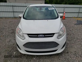2016 Ford C-Max Energi SEL with VIN 1FADP5CUXGL117043, listed as a Copart auction lot 63949323 with 86,944 mi miles. Bid and sale history available at carsss.com. Image 5.