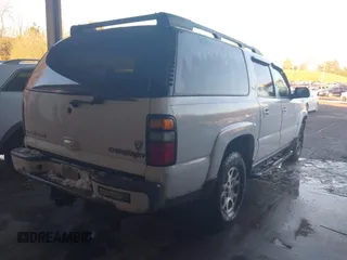 2005 Chevrolet Suburban Z71 with VIN 3GNFK16Z35G264713, listed as a IAAI auction lot 41255425 with 237,805 mi miles. Bid and sale history available at carsss.com. Image 4.