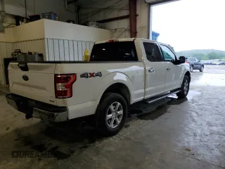 2019 Ford F-150 XL with VIN 1FTFW1E4XKFA16846, listed as a Copart auction lot 61345795 with 128,587 mi miles and Salvage title. Bid and sale history available at DreamBid. Image 3.