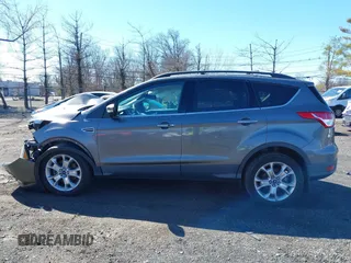 2013 Ford Escape SEL with VIN 1FMCU9H97DUD30608, listed as a IAAI auction lot 41800073 with 102,180 mi miles. Bid and sale history available at carsss.com. Image 14.