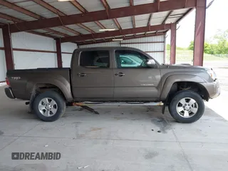 2013 Toyota Tacoma with VIN 3TMLU4EN4DM118438, listed as a IAAI auction lot 42285446 with 162,751 mi miles and . Bid and sale history available at DreamBid. Image 12.