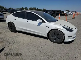 2023 Tesla Model 3 z VIN 5YJ3E1EA6PF540776, wystawiony jako Copart lot #59879575 z przebiegiem 19 320 mil mil oraz Szkoda całkowita • Salvage title. Historia ofert i sprzedaży dostępna na DreamBid. Obrazek 4.