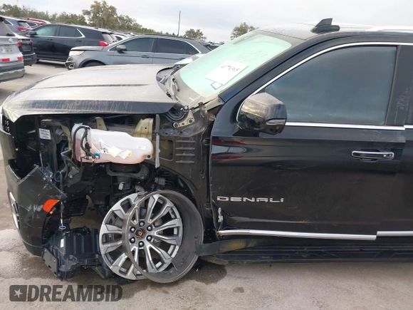 2021 GMC Yukon Denali with VIN 1GKS2DKL3MR308321, listed as a IAAI auction lot 41771365 with 63,415 mi miles. Bid and sale history available at carsss.com. Image 18.
