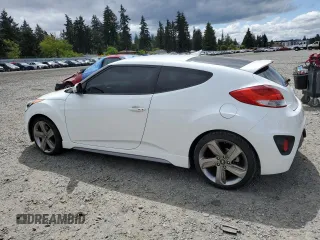 2013 Hyundai Veloster Turbo z VIN KMHTC6AE2DU163017, wystawiony jako Copart lot #56804365 z przebiegiem 105 325 mil mil oraz Czysty tytuł • Clean title. Historia ofert i sprzedaży dostępna na DreamBid. Obrazek 2.