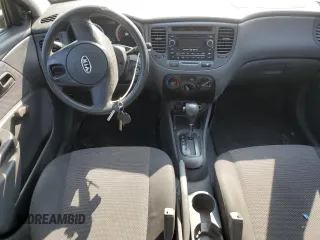 2011 Kia Rio with VIN KNADH4B38B6725531, listed as a Copart auction lot 72389974 with 124,315 mi miles and Salvage Title. Bid and sale history available at DreamBid. Image 8.