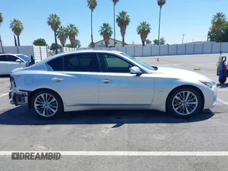 2018 Infiniti Q50 Luxe with VIN JN1EV7AP6JM352203, listed as a IAAI auction lot 42708336 with 79,994 mi miles and . Bid and sale history available at DreamBid. Image 14.