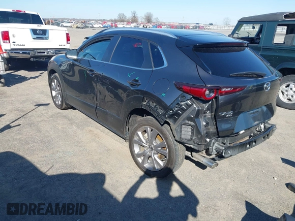 2022 Mazda CX-30 S Select with VIN 3MVDMBBL2NM442323, listed as a IAAI auction lot 41765707 with 40,848 mi miles and . Bid and sale history available at DreamBid. Image 3.