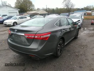 2014 Toyota Avalon Limited with VIN 4T1BK1EBXEU109256, listed as a IAAI auction lot 41908504 with 84,472 mi miles and . Bid and sale history available at DreamBid. Image 4.