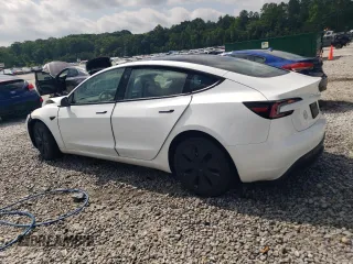 2025 Tesla Model 3 Long Range with VIN 5YJ3E1EA3SF889774, listed as a Copart auction lot 57493425 with 5,167 mi miles and Salvage title. Bid and sale history available at DreamBid. Image 2.