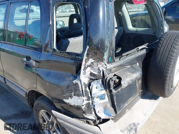 2003 Chevrolet Tracker with VIN 2CNBE13C736921273, listed as a IAAI auction lot 41453815 with 150,768 mi miles and . Bid and sale history available at DreamBid. Image 6.