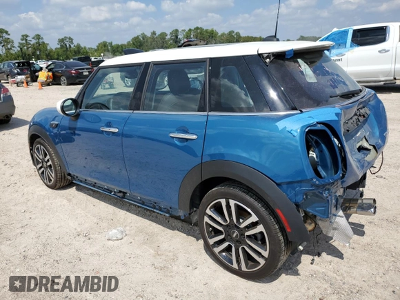 2023 MINI Hardtop 4 Door Cooper S with VIN WMW53DK07P2T87451, listed as a Copart auction lot 71447054 with 2,825 mi miles and Salvage title. Bid and sale history available at DreamBid. Image 2.