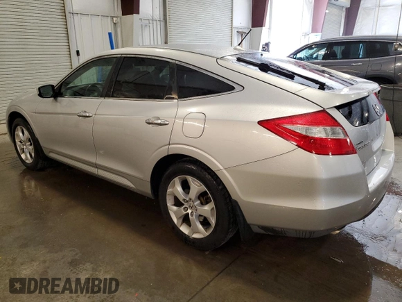 2010 Honda Crosstour EX-L z VIN 5J6TF1H50AL010880, wystawiony jako Copart lot #55805665 z przebiegiem 116 323 mil mil oraz Szkody całkowita. Historia ofert i sprzedaży dostępna na DreamBid. Obrazek 2.