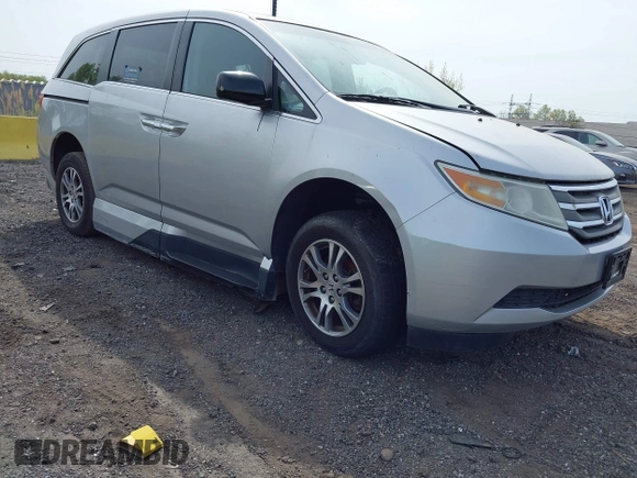 2011 Honda Odyssey EX-L with VIN 5FNRL5H61BB067456, listed as a IAAI auction lot 42131999 with 150,358 mi miles and . Bid and sale history available at carsss.com. Image 1.