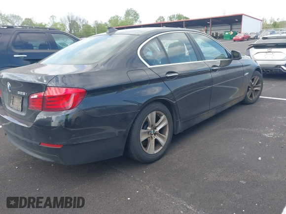 2011 BMW 5 Series 528i with VIN WBAFR1C52BDS36073, listed as a IAAI auction lot 42023987 with 139,736 mi miles and . Bid and sale history available at carsss.com. Image 4.