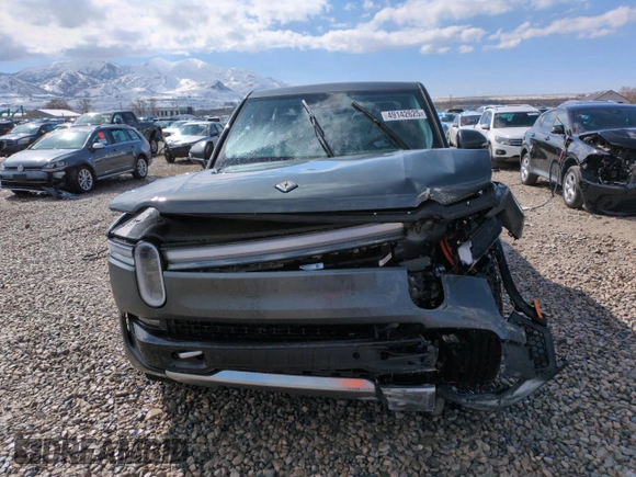 2025 Rivian R1T Adventure z VIN 7FCTGBAA6SN035587, wystawiony jako Copart lot #49142625 z przebiegiem Nie podano mil oraz Szkody całkowita. Historia ofert i sprzedaży dostępna na DreamBid. Obrazek 5.