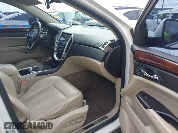 2013 Cadillac SRX Performance Collection z VIN 3GYFNDE38DS542736, wystawiony jako IAAI lot #42398648 z przebiegiem 266 059 mil mil oraz . Historia ofert i sprzedaży dostępna na DreamBid. Obrazek 5.
