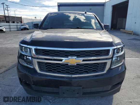2017 Chevrolet Suburban LS with VIN 1GNSCGECXHR351539, listed as a Copart auction lot 87070214 with 246,129 mi miles and Salvage title. Bid and sale history available at DreamBid. Image 5.