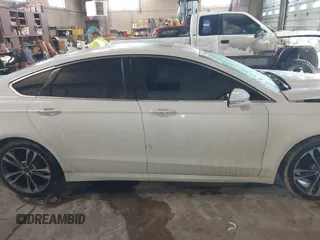 2019 Ford Fusion Titanium with VIN 3FA6P0D92KR153096, listed as a IAAI auction lot 41679393 with 127,292 mi miles and . Bid and sale history available at DreamBid. Image 14.