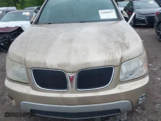 2007 Pontiac Torrent with VIN 2CKDL63F076029018, listed as a IAAI auction lot 42088457 with 153,326 mi miles. Bid and sale history available at carsss.com. Image 6.