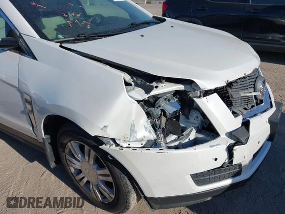 2010 Cadillac SRX Luxury Collection z VIN 3GYFNDEY0AS583143, wystawiony jako IAAI lot #41989581 z przebiegiem 186 731 mil mil oraz . Historia ofert i sprzedaży dostępna na DreamBid. Obrazek 12.