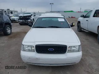 2006 Ford Police Interceptor z VIN 2FAFP71W96X150559, wystawiony jako IAAI lot #41590316 z przebiegiem 127 728 mil mil oraz . Historia ofert i sprzedaży dostępna na DreamBid. Obrazek 12.