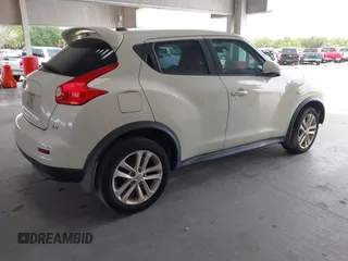 2011 Nissan Juke SV with VIN JN8AF5MR3BT014165, listed as a IAAI auction lot 42211353 with 125,731 mi miles and . Bid and sale history available at carsss.com. Image 4.