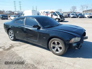 2013 Dodge Charger RT with VIN 2C3CDXCT4DH712064, listed as a IAAI auction lot 41980446 with 187,192 mi miles and . Bid and sale history available at carsss.com. Image 1.
