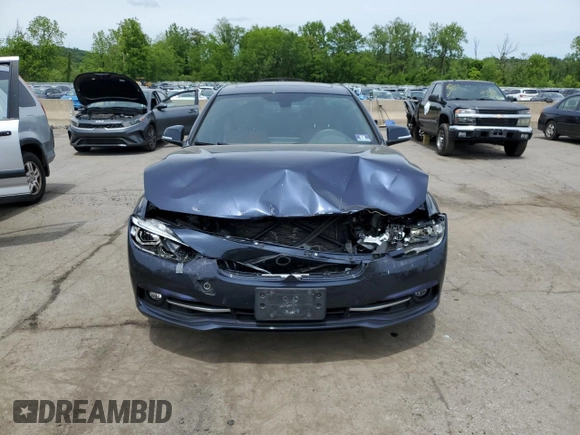 2017 BMW 3 Series 330i xDrive with VIN WBA8D9G31HNU65104, listed as a Copart auction lot 58523515 with 54,856 mi miles and Salvage title. Bid and sale history available at DreamBid. Image 5.