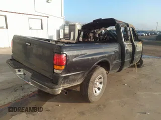 1999 Mazda B-Series 2WD Truck SE with VIN 4F4YR16V8XTM13964, listed as a IAAI auction lot 39963394 with 1 mi miles. Bid and sale history available at carsss.com. Image 4.
