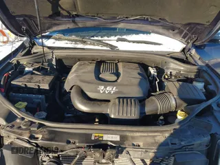 2014 Jeep Grand Cherokee Overland with VIN 1C4RJFCG1EC200570, listed as a IAAI auction lot 41301398 with 183,986 mi miles. Bid and sale history available at carsss.com. Image 10.