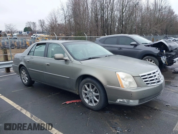 2010 Cadillac DTS 1SC z VIN 1G6KD5EY3AU134362, wystawiony jako IAAI lot #41579786 z przebiegiem 131 969 mil mil oraz . Historia ofert i sprzedaży dostępna na DreamBid. Obrazek 1.