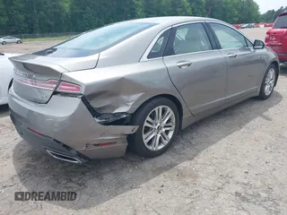 2016 Lincoln MKZ z VIN 3LN6L2G90GR621326, wystawiony jako IAAI lot #42375905 z przebiegiem 56 169 mil mil oraz . Historia ofert i sprzedaży dostępna na DreamBid. Obrazek 4.