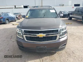 2015 Chevrolet Suburban LT with VIN 1GNSCJKCXFR175154, listed as a IAAI auction lot 42280418 with 227,373 mi miles and . Bid and sale history available at DreamBid. Image 12.