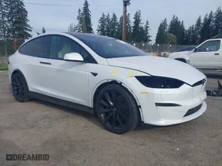 2022 Tesla Model X with VIN 7SAXCBE54NF363113, listed as a IAAI auction lot 41978397 with 27,166 mi miles. Bid and sale history available at carsss.com. Image 1.