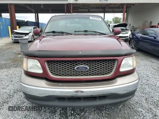 2003 Ford F-150 XLT with VIN 1FTRW07673KA75061, listed as a Copart auction lot 52034595 with Not Provided miles and Salvage Title. Bid and sale history available at carsss.com. Image 5.