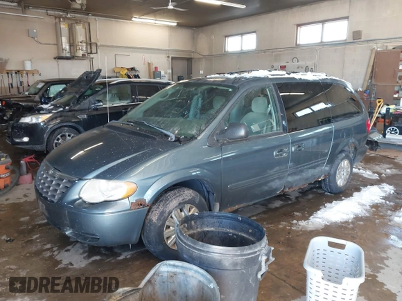 2006 Chrysler Town & Country LX with VIN 2A4GP44R86R794961, listed as a IAAI auction lot 41615727 with 140,733 mi miles and . Bid and sale history available at DreamBid. Image 2.