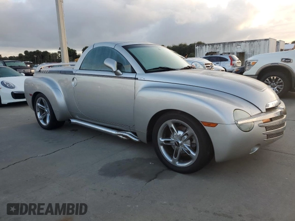 2004 Chevrolet SSR LS z VIN 1GCES14P14B105315, wystawiony jako Copart lot #74983944 z przebiegiem Nie podano mil oraz Szkoda całkowita • Salvage title. Historia ofert i sprzedaży dostępna na DreamBid. Obrazek 4.