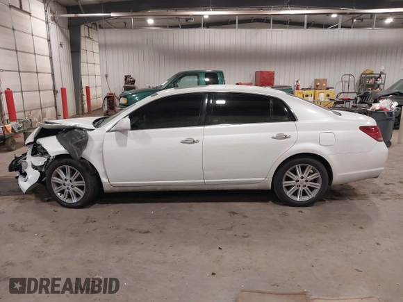 2010 Toyota Avalon XL with VIN 4T1BK3DB9AU358803, listed as a IAAI auction lot 41072257 with 157,185 mi miles and . Bid and sale history available at DreamBid. Image 14.
