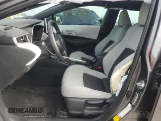 2025 Toyota Corolla Hatchback SE with VIN JTND4MBEXS3233984, listed as a Copart auction lot 73129614 with 4,581 mi miles and Salvage Title. Bid and sale history available at carsss.com. Image 7.