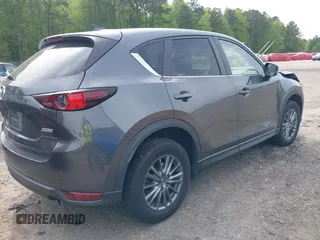 2017 Mazda CX-5 Touring z VIN JM3KFBCL4H0178747, wystawiony jako IAAI lot #42041380 z przebiegiem 112 083 mil mil oraz . Historia ofert i sprzedaży dostępna na DreamBid. Obrazek 4.