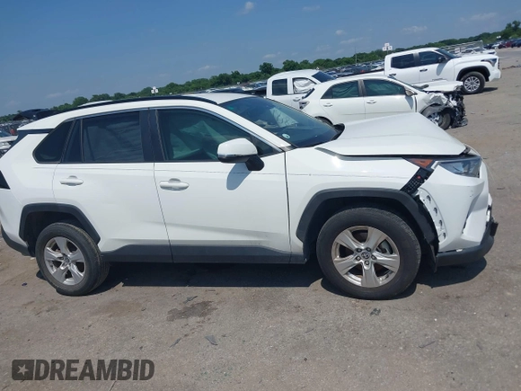 2021 Toyota RAV4 XLE with VIN JTMW1RFV2MD063839, listed as a IAAI auction lot 42406891 with 69,490 mi miles and . Bid and sale history available at DreamBid. Image 13.