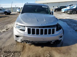 2014 Jeep Grand Cherokee Overland with VIN 1C4RJFCG2EC281062, listed as a Copart auction lot 47099225 with 127,660 mi miles and Salvage Title. Bid and sale history available at carsss.com. Image 5.